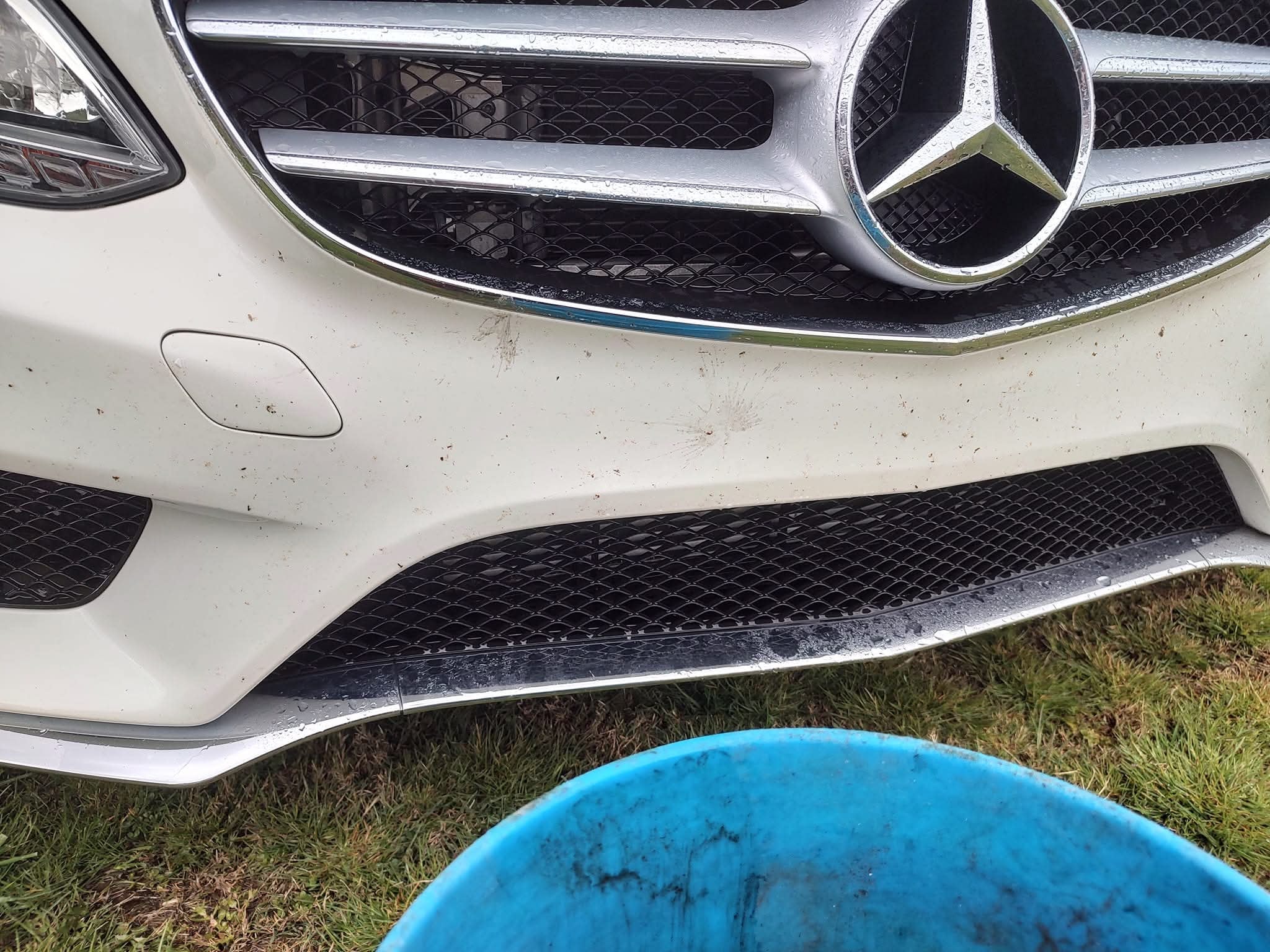 Dusty, grimy sedan before exterior wash